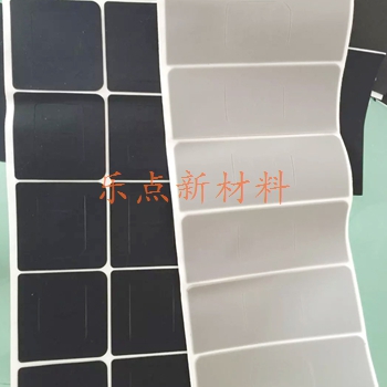 Single sided silicone pad with adhesive